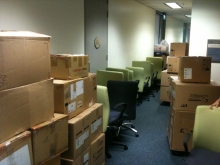 Office contents staged up on dollies and ready to be rolled to the trucks