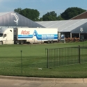 Delivering exhibit material to a PGA golf event