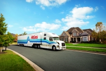 An Atlas Van Lines tractor-trailer moving van
