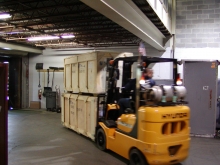Moving trade show crates inside our warehouse