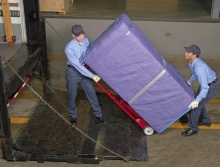 Moving an pad-wrapped cabinet using a Maxon railgate