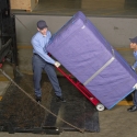 Moving an pad-wrapped cabinet using a Maxon railgate Moving an pad-wrapped cabinet using a Maxon railgate