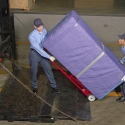 Moving an pad-wrapped cabinet using a Maxon railgate